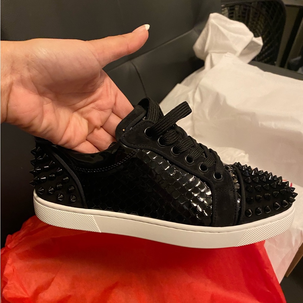 Christian Louboutin red bottom women’s spiked sneakers